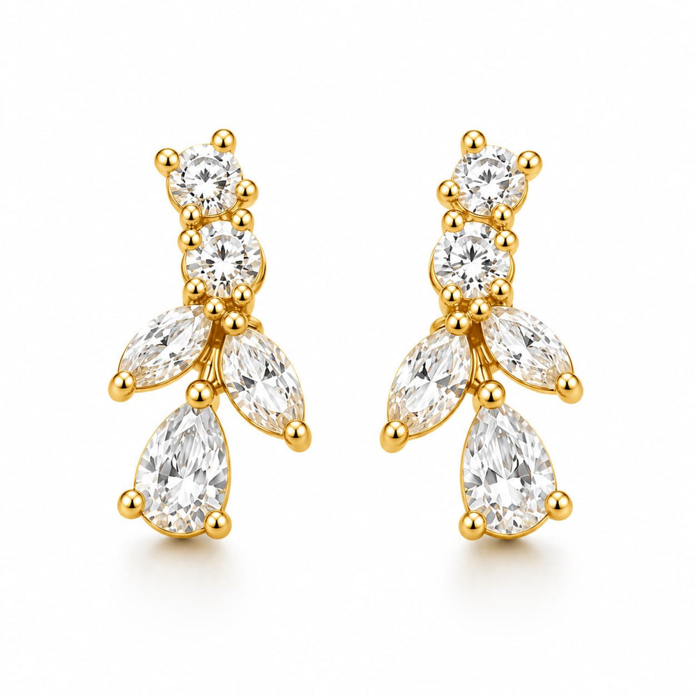 A pair of gold drop earrings featuring clear round and marquise-cut gemstones, displayed on a clean white background.