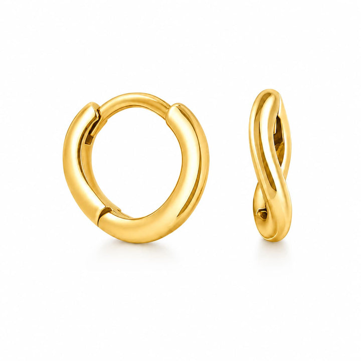 Two gold huggie hoop earrings on a clean white background, one shown from the front and the other from the side.