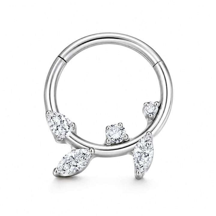 A silver-toned circular hoop piercing ring decorated with four clear marquise and round-cut gemstones, shown on a clean white background.