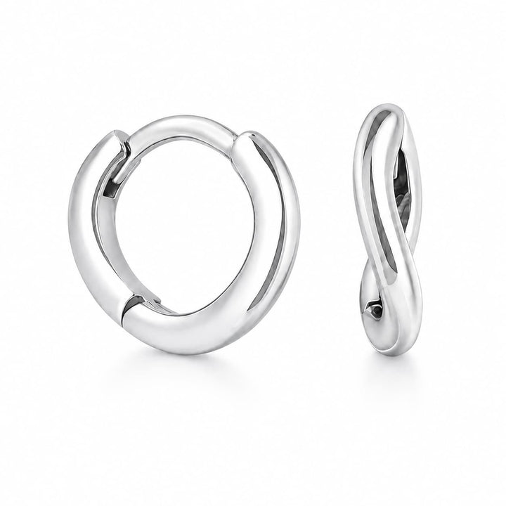 A pair of polished silver huggie hoop earrings, one shown from the front and the other from the side profile, on a clean white background.